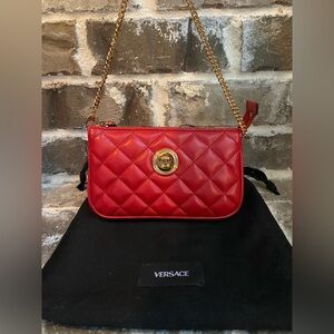 red quilted leather Versace La Medusa mini bag with gold-tone hardware